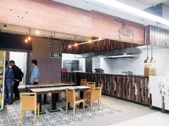 物美改造門店欲扭轉老化形象 超市+餐飲將成常態？
